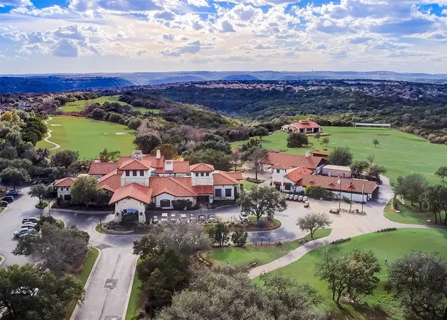 an aerial view of a house with a garden