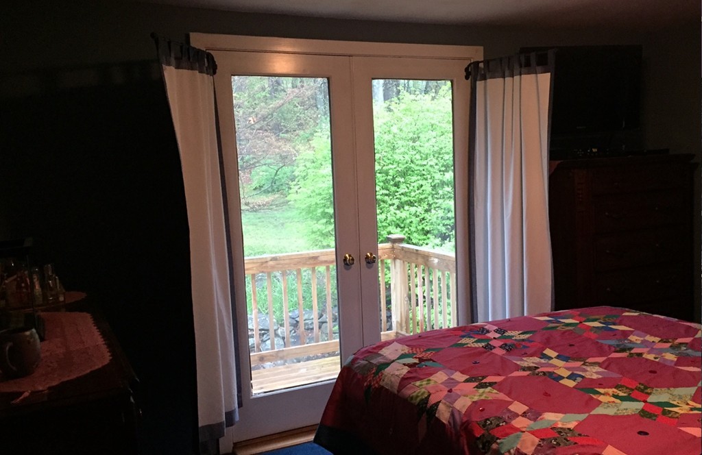 39 Old Bolton Road Hudson, MA 01749 - Photo 9 of 19 a bedroom with a bed and a window