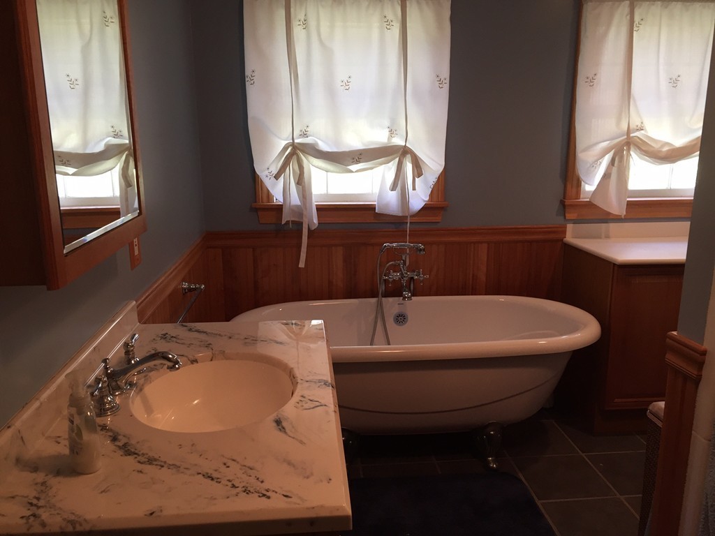 39 Old Bolton Road Hudson, MA 01749 - Photo 10 of 19 a bathroom with a sink and a mirror
