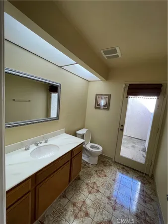 a view of an empty room with a fireplace