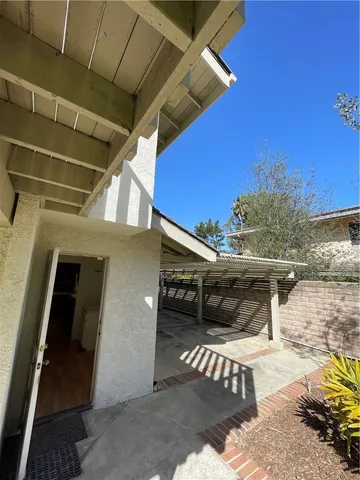 a view of hallway with wooden floor