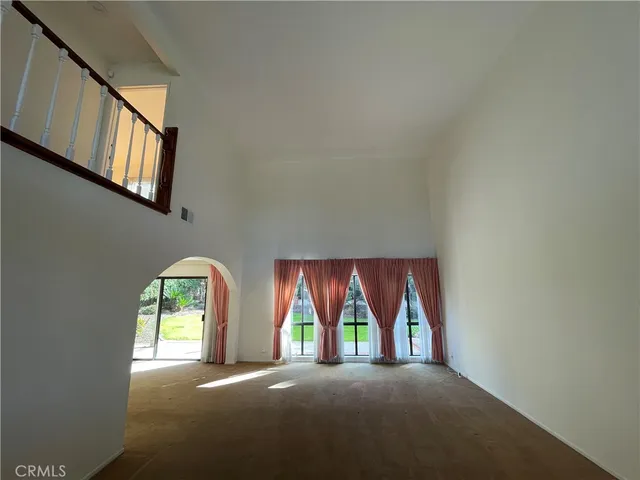 a kitchen with stainless steel appliances a sink and a stove