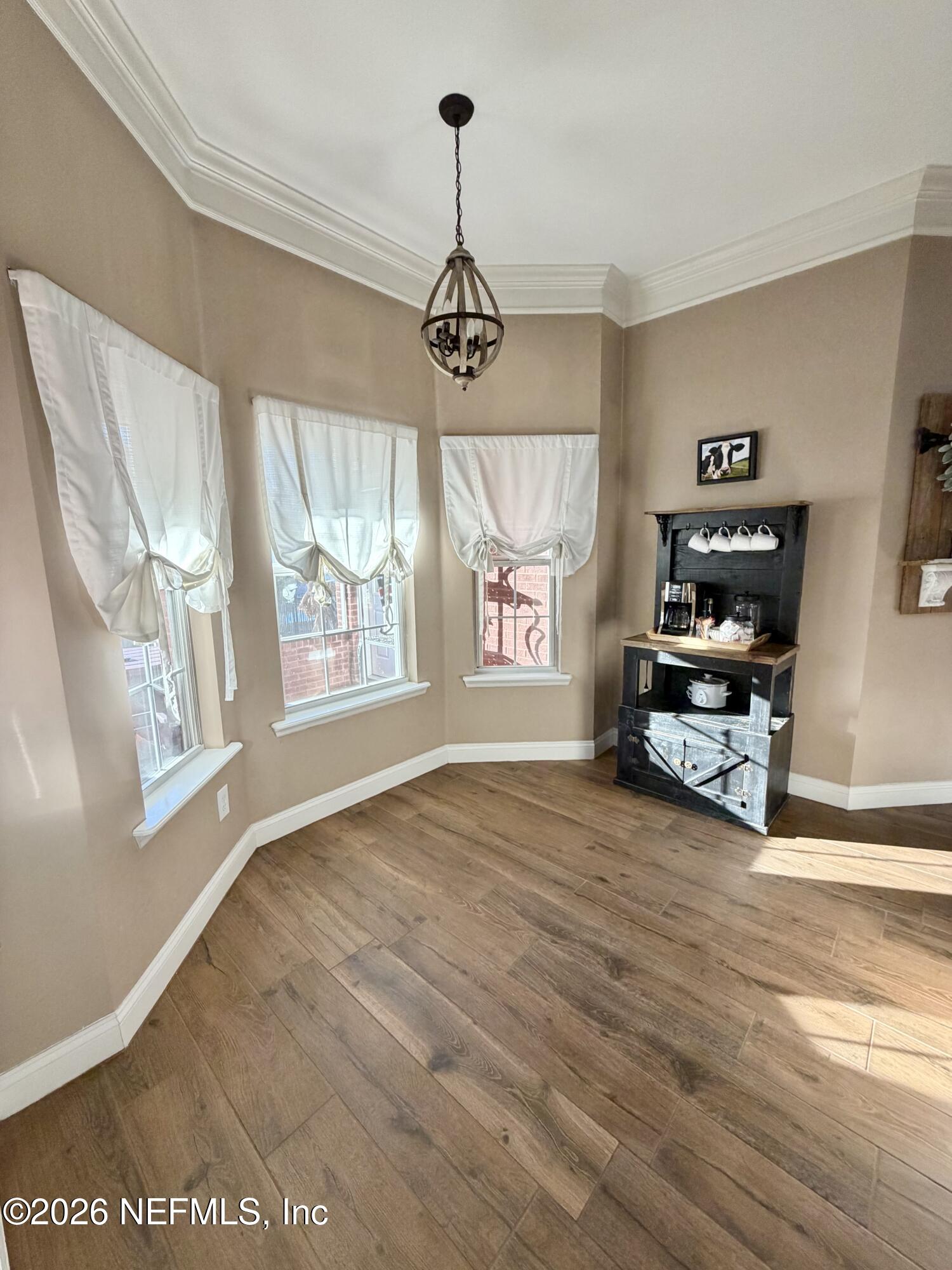6116 Copper Drive Macclenny, FL 32063 - Photo 11 of 21 a view of an empty room with a window