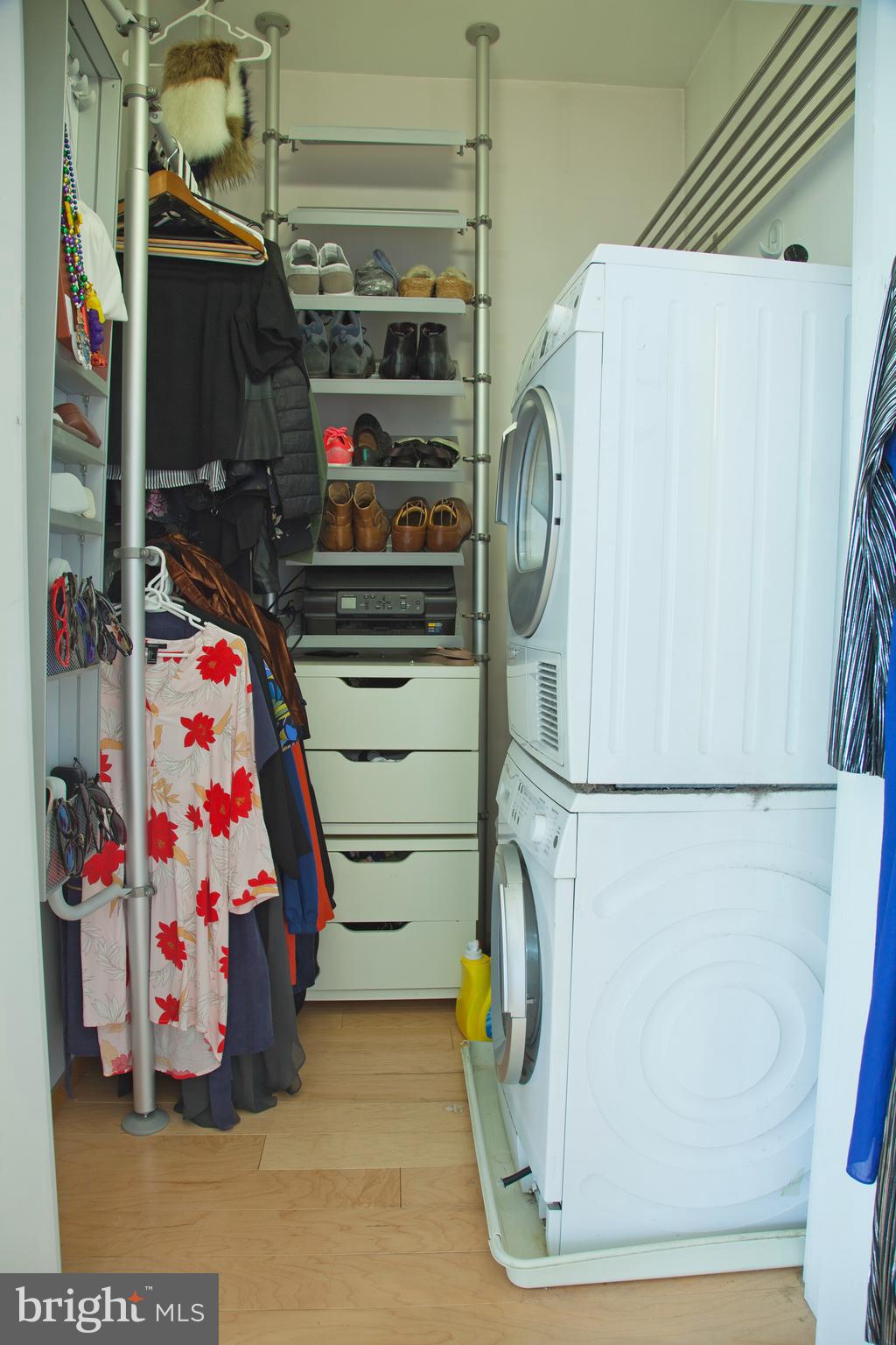 2250 11th Street Northwest, Unit 304 Washington, DC 20001 - Photo 12 of 17 a view of storage and utility room with washer and dryer