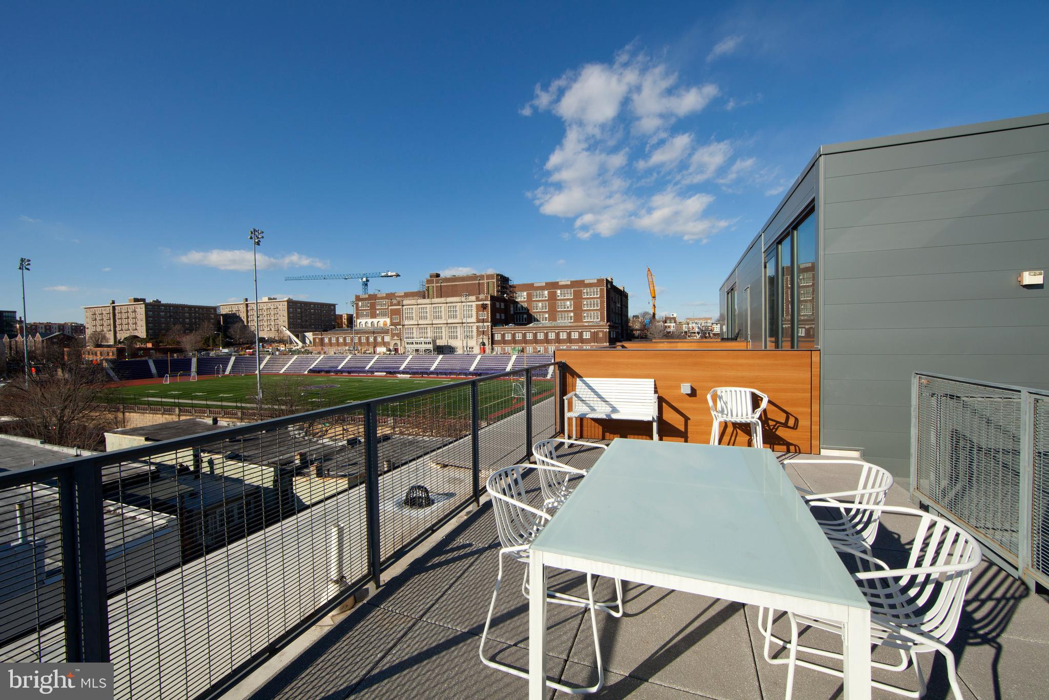 2250 11th Street Northwest, Unit 304 Washington, DC 20001 - Photo 16 of 17 a terrace of a house with outdoor seating