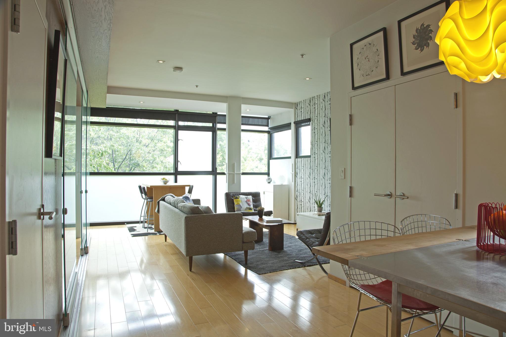 2250 11th Street Northwest, Unit 304 Washington, DC 20001 - Photo 5 of 17 a living room with large window