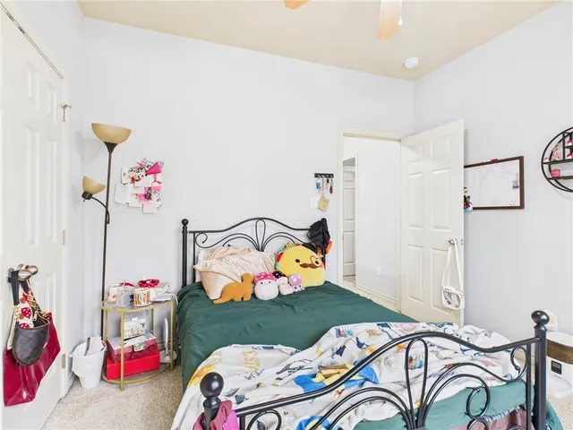 a bed room with a bed and a table