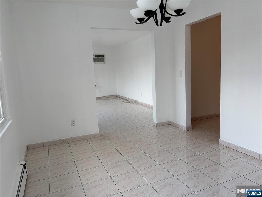 238 Clark Terrace, Unit 2 Cliffside Park, NJ 07010 - Photo 5 of 13 an empty room with a empty space