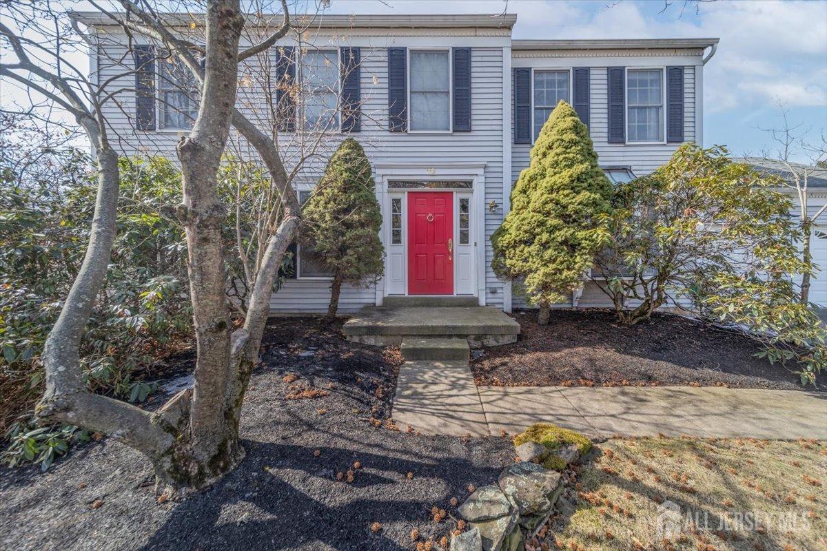 12 Adams Road Kendall Park, NJ 08824 - Photo 1 of 40 a front view of a house with garden
