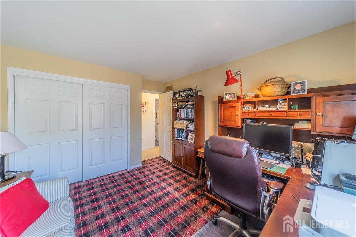 12 Adams Road Kendall Park, NJ 08824 - Photo 22 of 40 a bedroom with furniture and a window