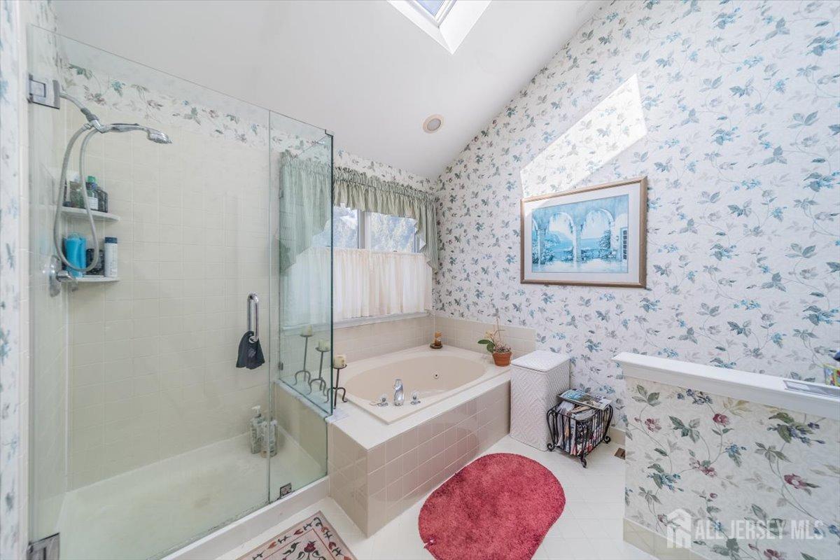 12 Adams Road Kendall Park, NJ 08824 - Photo 30 of 40 a bathroom with a sink toilet and shower