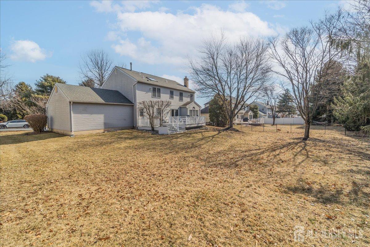 12 Adams Road Kendall Park, NJ 08824 - Photo 36 of 40 a view of a house with a snow in the yard