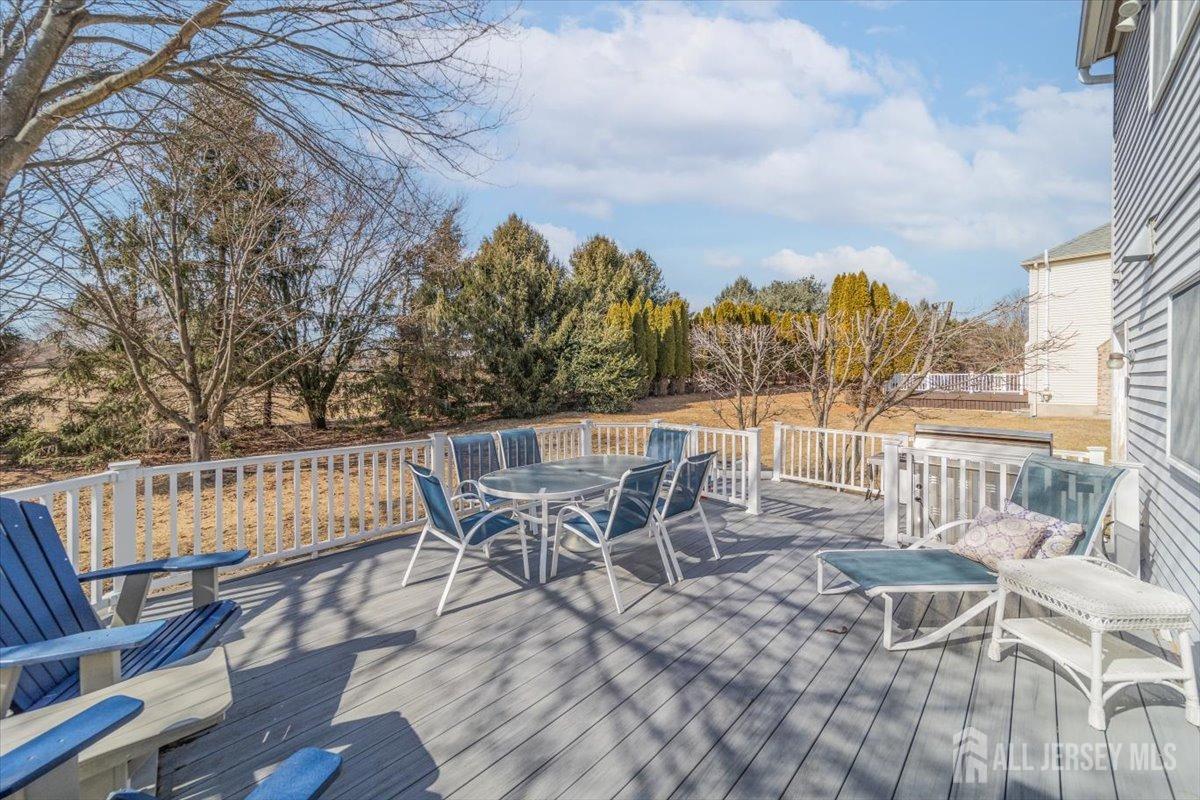 12 Adams Road Kendall Park, NJ 08824 - Photo 40 of 40 a view of a patio with furniture