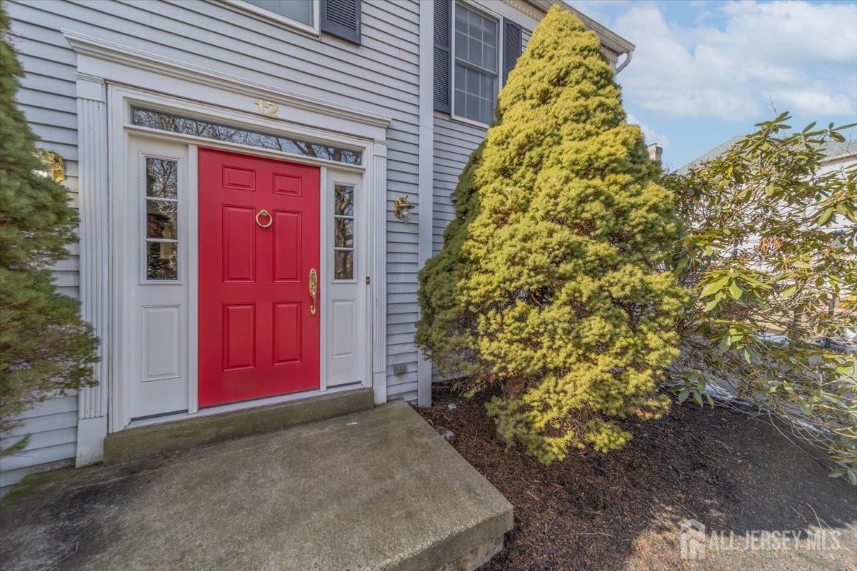 12 Adams Road Kendall Park, NJ 08824 - Photo 5 of 40 a view of entryway door of the house