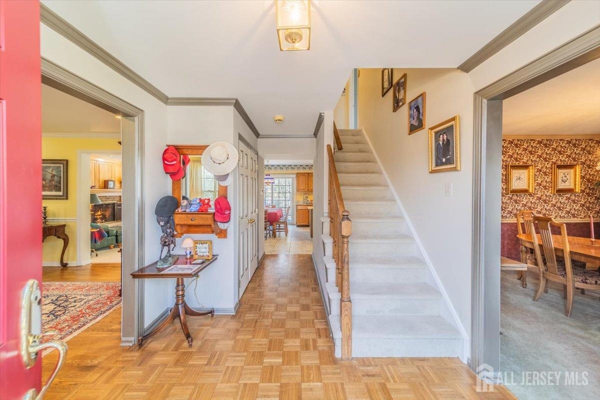 12 Adams Road Kendall Park, NJ 08824 - Photo 6 of 40 a living room with furniture and a floor to ceiling window