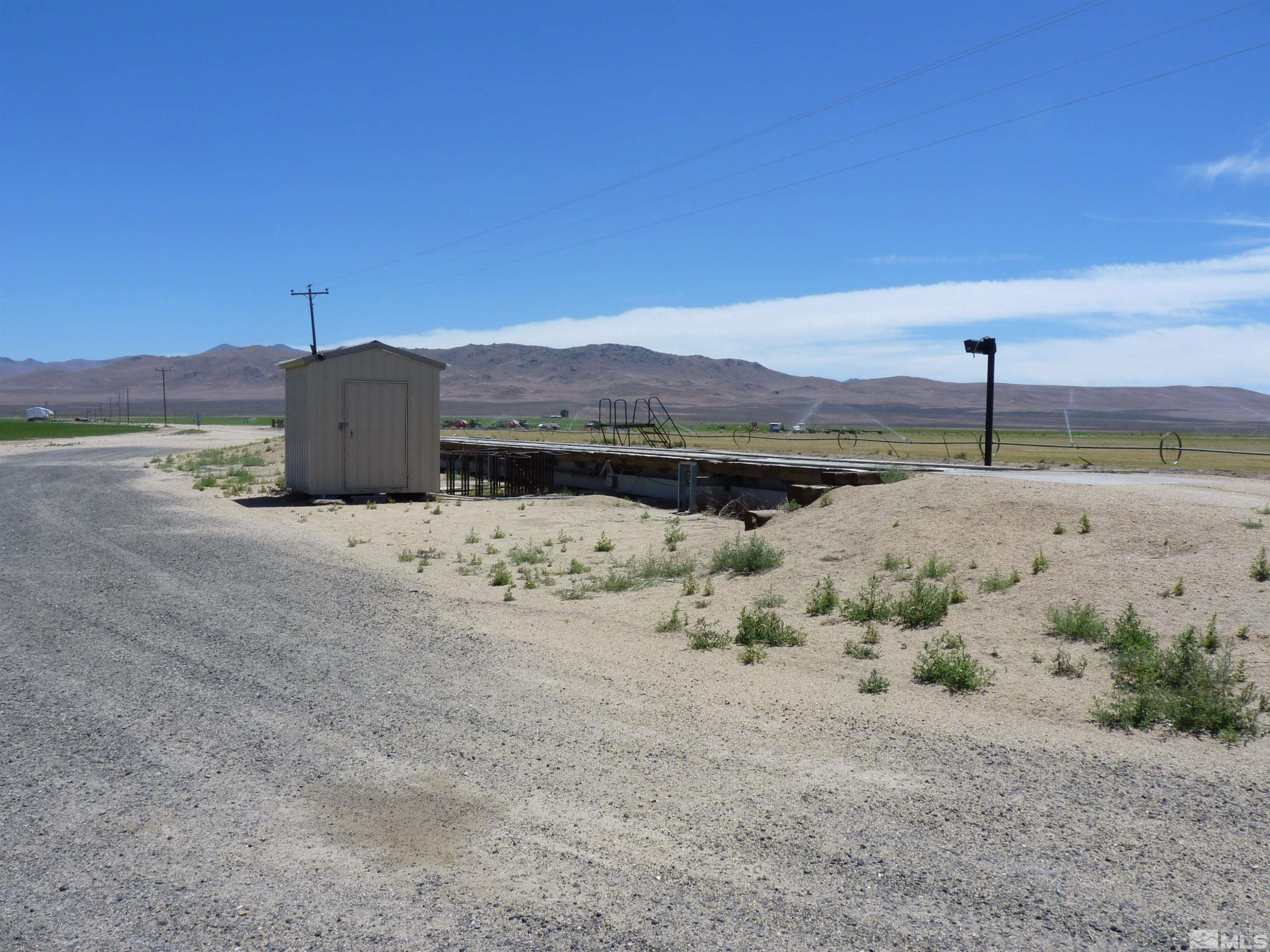 51955 Wilder Creek Road Denio, NV 89404 - Photo 19 of 36 a view of a lake with a mountain in the background