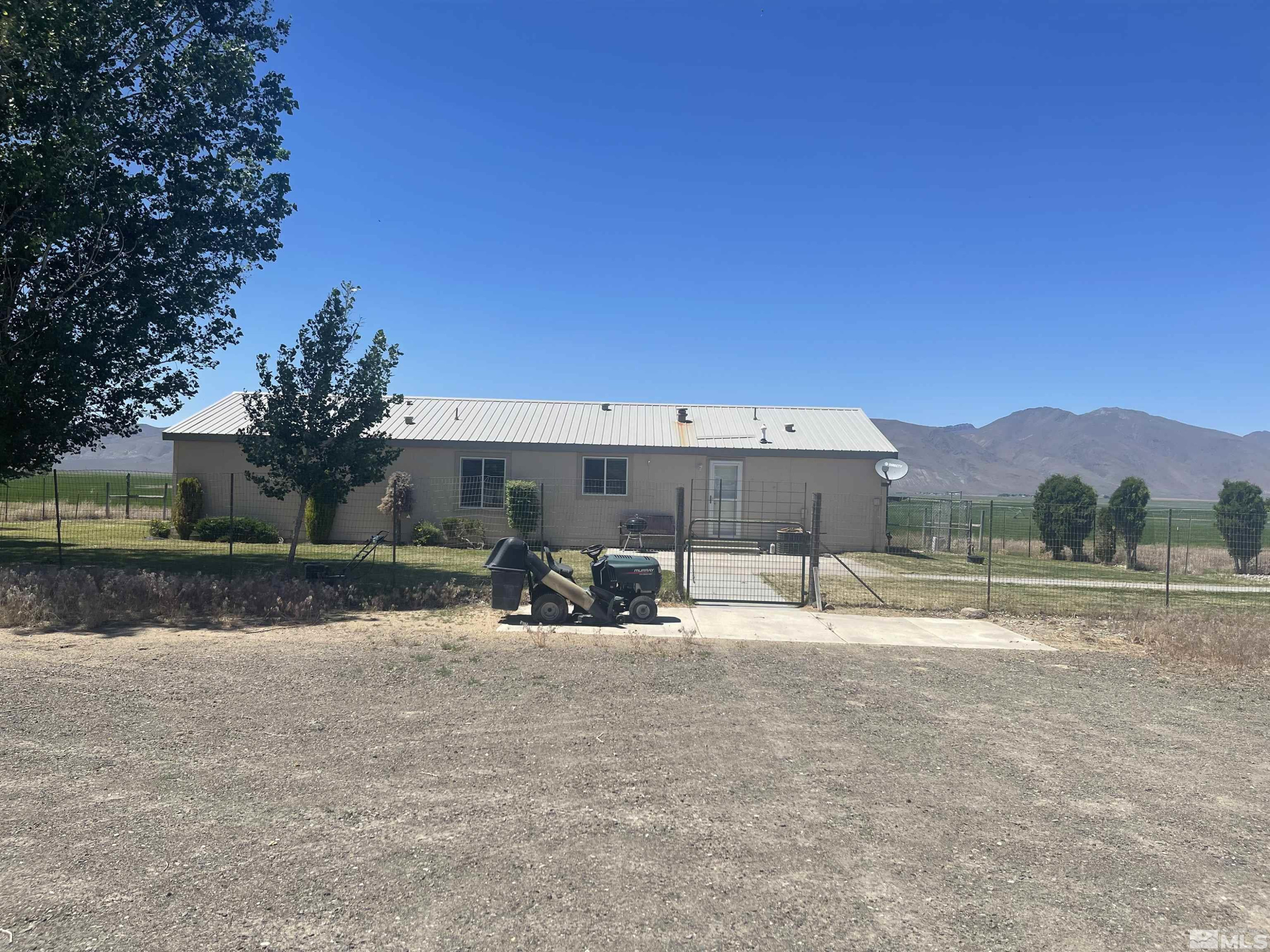 51955 Wilder Creek Road Denio, NV 89404 - Photo 2 of 36 a view of a house with a yard