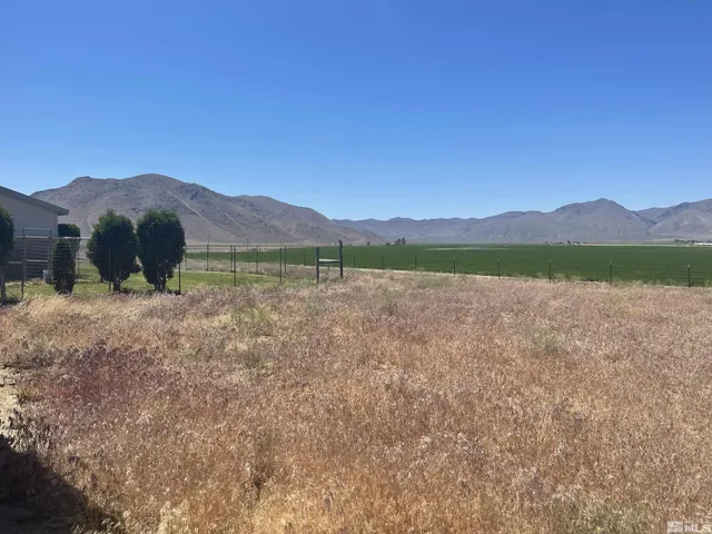 a view of an outdoor space and mountain view