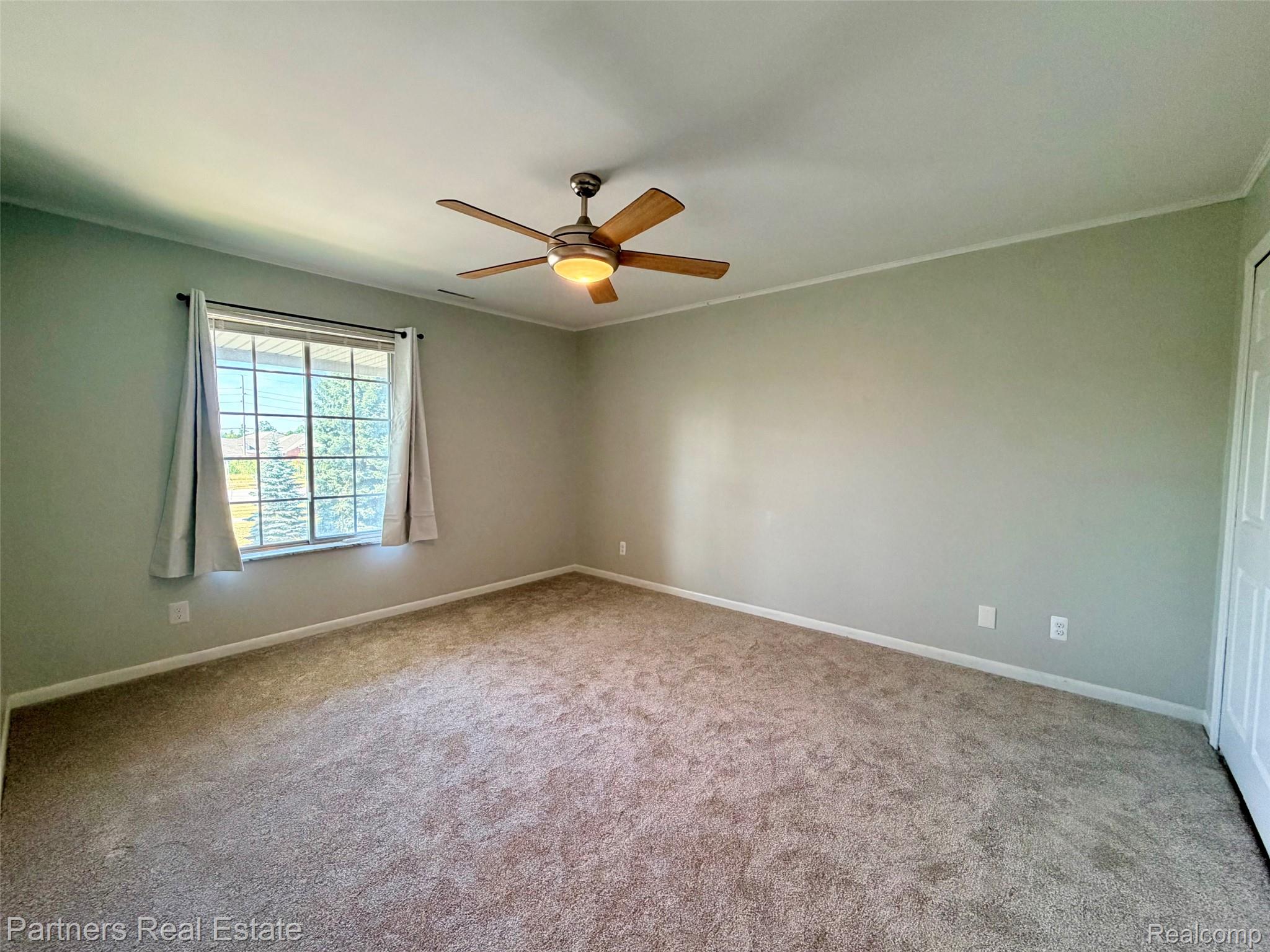 507 West Highland Road, Unit 11 Howell, MI 48843 - Photo 20 of 29 Primary Bedroom