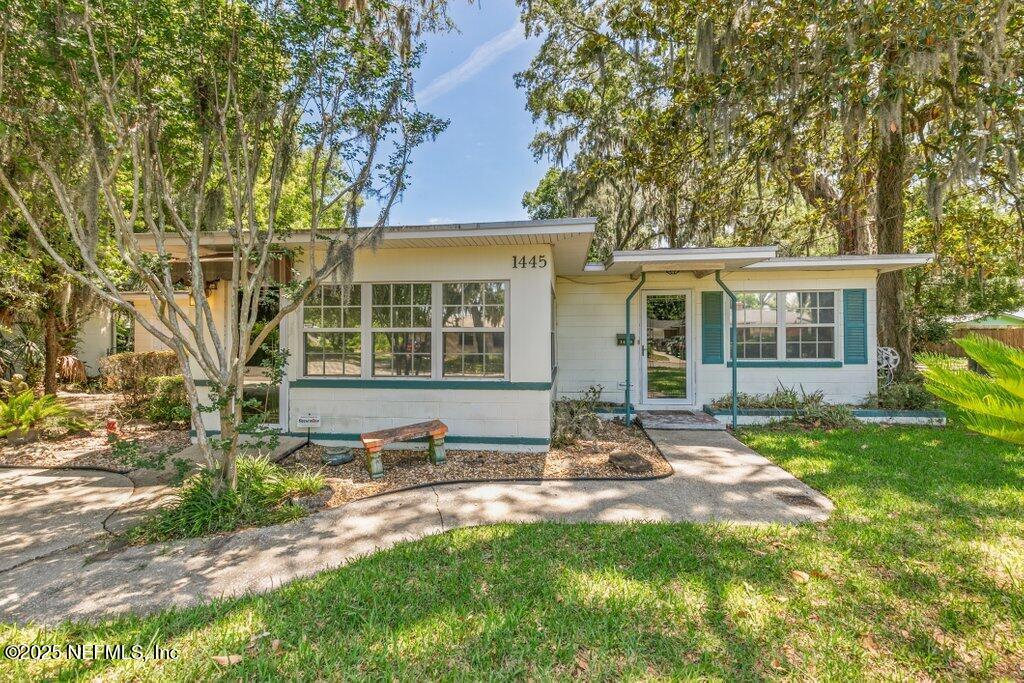 1445 Somerville Road Jacksonville, FL 32207 - Photo 5 of 49 front view of a house with a yard