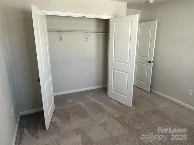 an empty room with closet