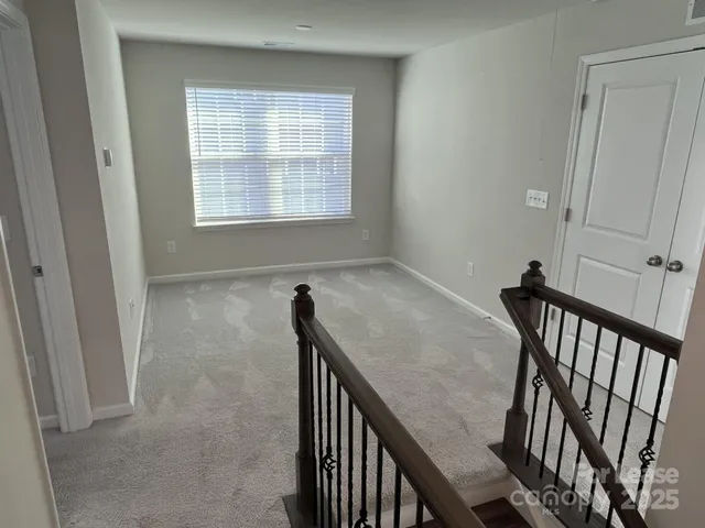 a view of livingroom with furniture and window