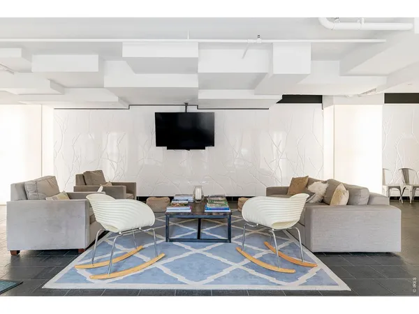 a view of a garage with a bike and car