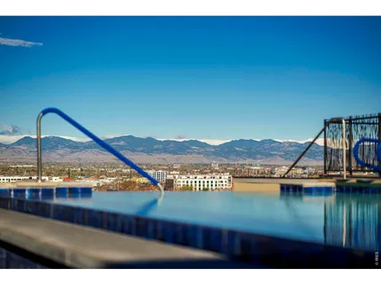 a view of a lake with a house in the background