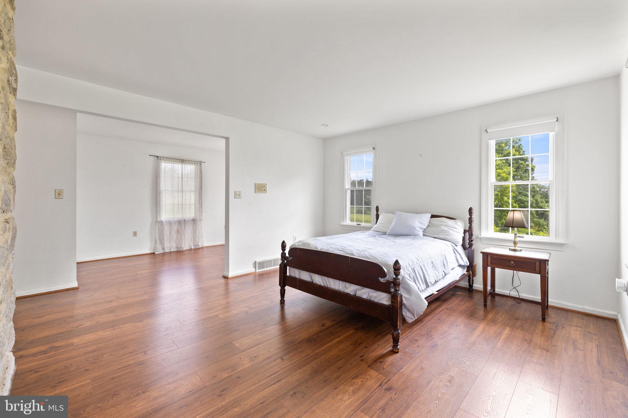 3659 South Ox Road Edinburg, VA 22824 - Photo 38 of 66 Spacious Primary Bedroom bathed in natural light