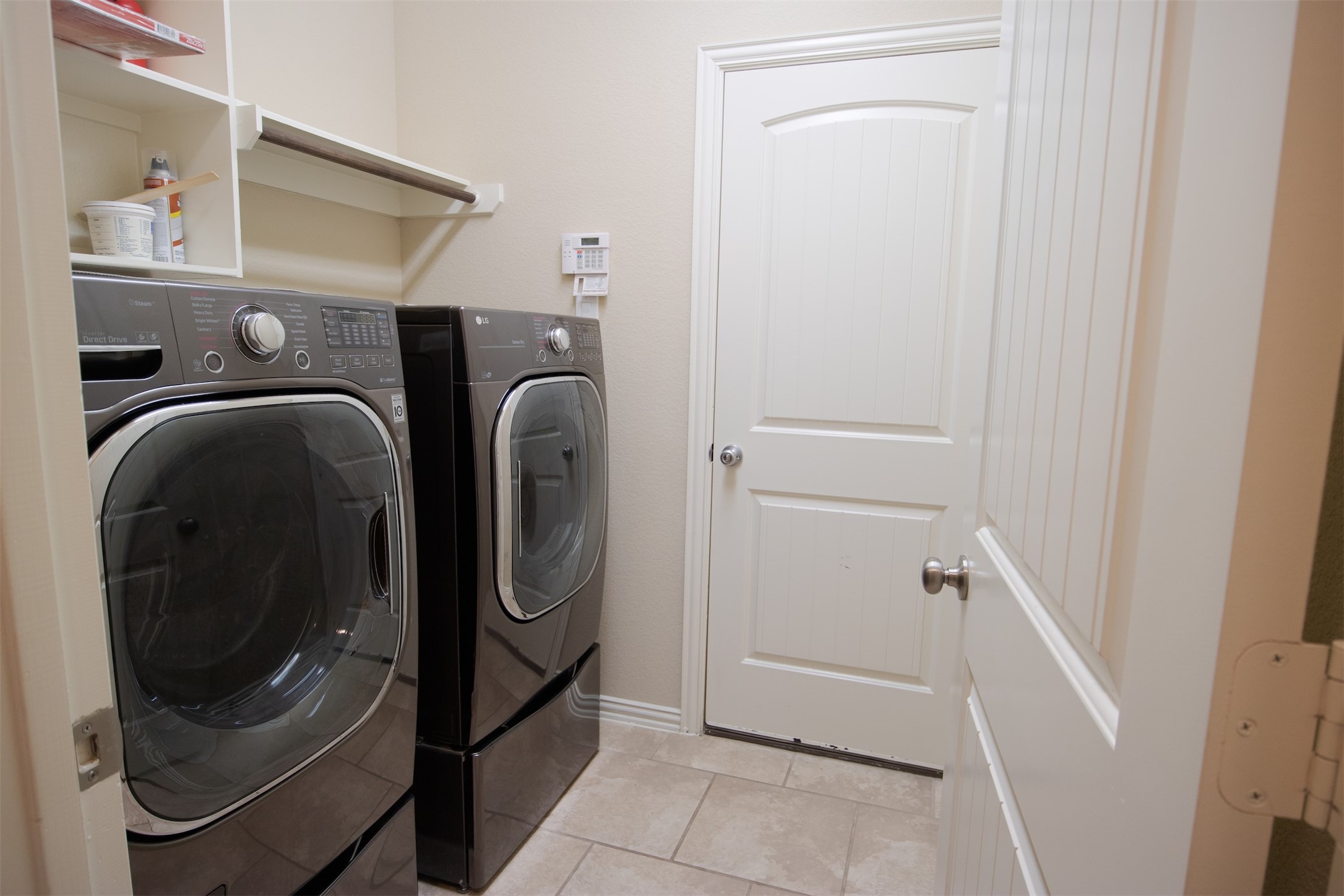 7042 Bristol Memorial Drive Spring, TX 77379 - Photo 20 of 21 a utility room with dryer and washer