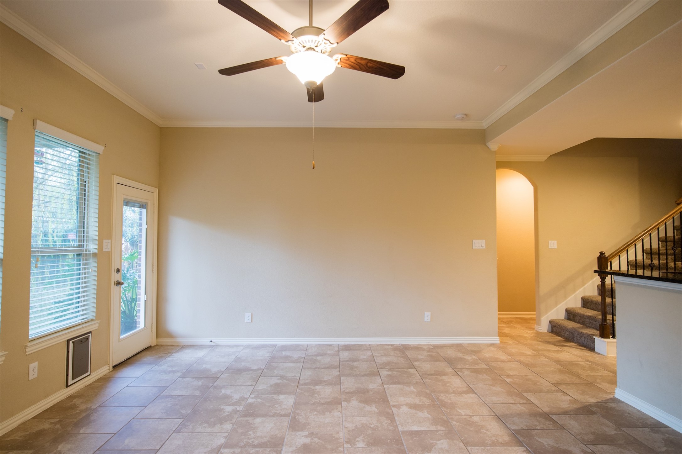 7042 Bristol Memorial Drive Spring, TX 77379 - Photo 8 of 21 a view of an empty room and a windows