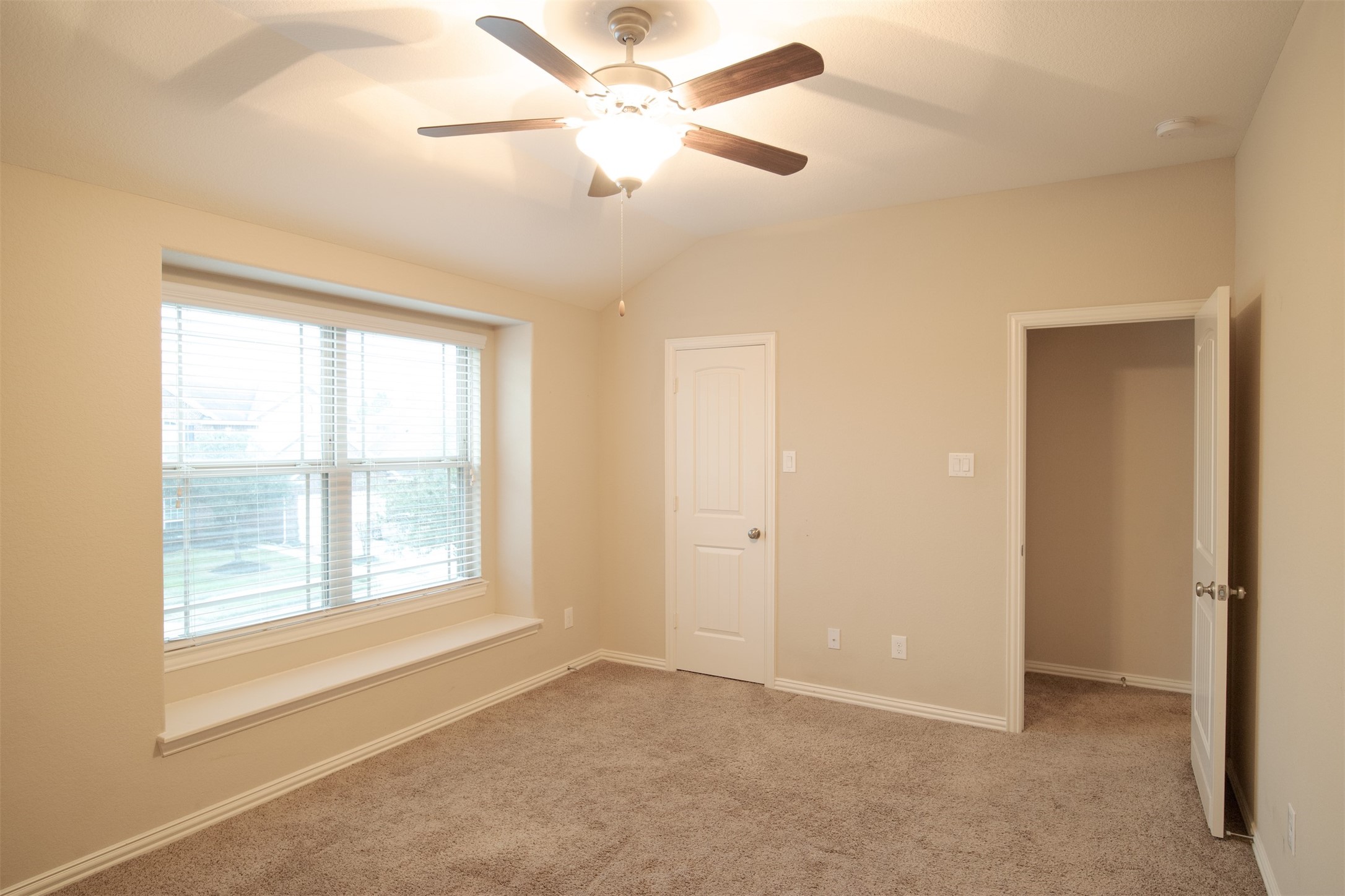 7042 Bristol Memorial Drive Spring, TX 77379 - Photo 10 of 21 a view of an empty room with a window