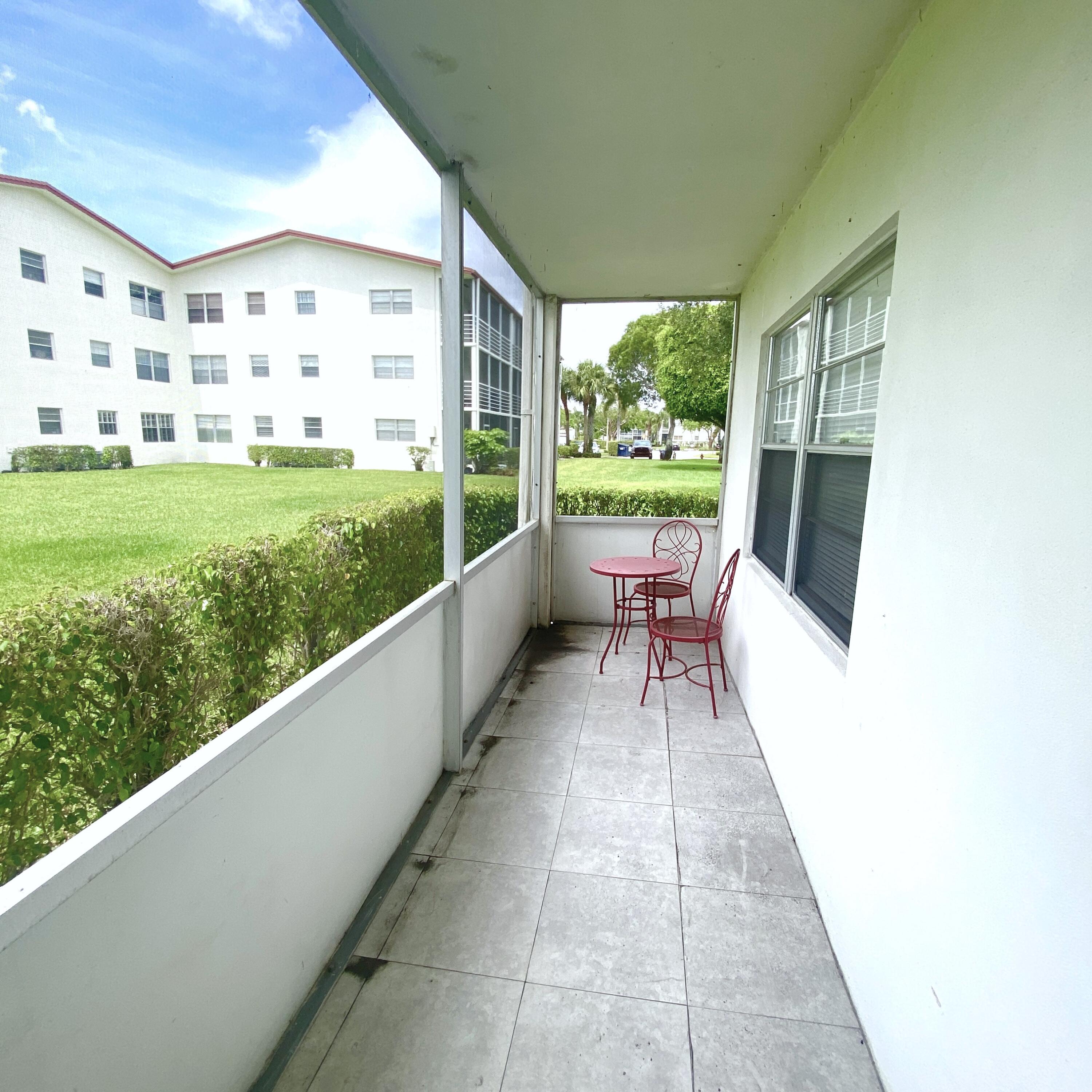 392 Brighton J Boca Raton, FL 33434 - Photo 31 of 54 Rear Patio