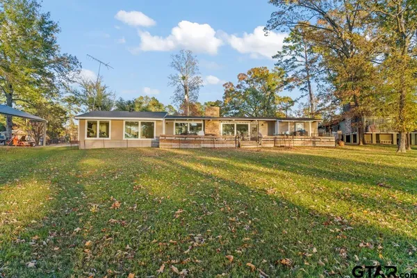 a view of a house with a big yard