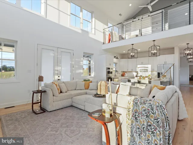 a bathroom with a sink a mirror and shower