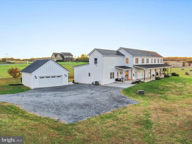 front view of a house with a big yard