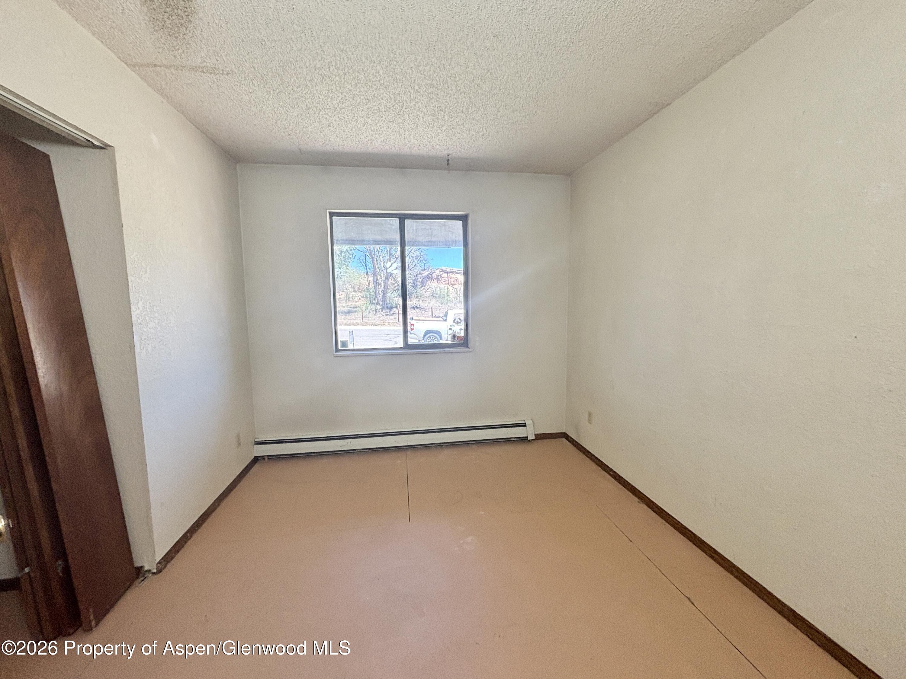 1623 West 7th Street Rifle, CO 81650 - Photo 11 of 21 an empty room with windows