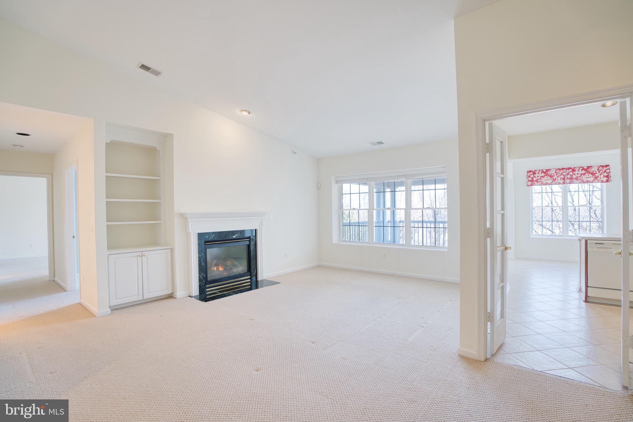 12330 Rosslare Ridge Road, Unit 505 Lutherville-Timonium, MD 21093 - Photo 15 of 45 Built-in shelving in Living Room