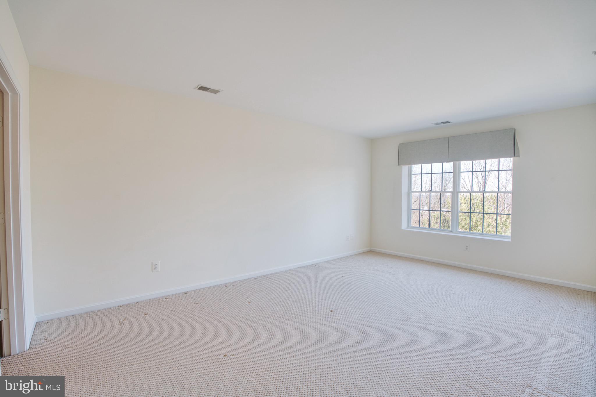 12330 Rosslare Ridge Road, Unit 505 Lutherville-Timonium, MD 21093 - Photo 25 of 45 Primary bedroom
