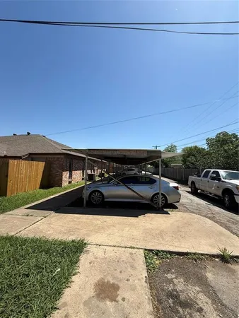 a view of a backyard of the house