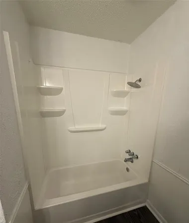 a bathroom with a bathtub