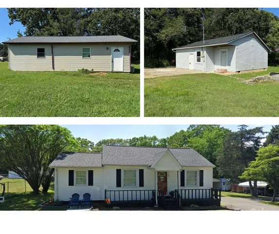 a view of house with backyard