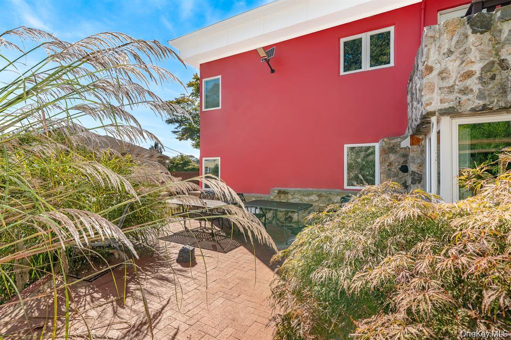 28 Riverside Avenue Amityville, NY 11701 - Photo 24 of 31 a front view of a house with a yard