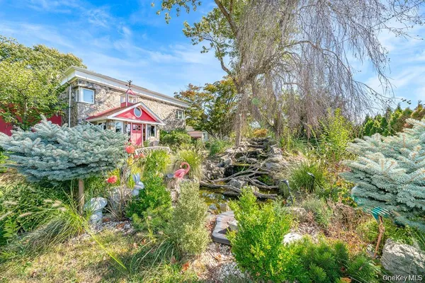 a street sign that is sitting in a forest