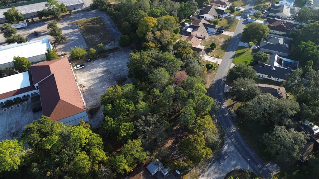 7931 Rhanbuoy Road Spring Hill, FL 34606 - Photo 7 of 14 an aerial view of a house with a yard