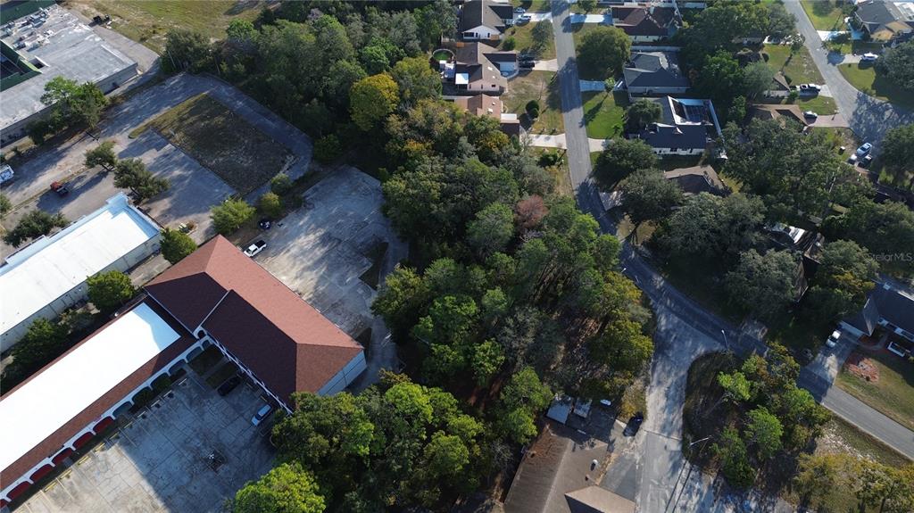 7931 Rhanbuoy Road Spring Hill, FL 34606 - Photo 8 of 14 an aerial view of multiple house