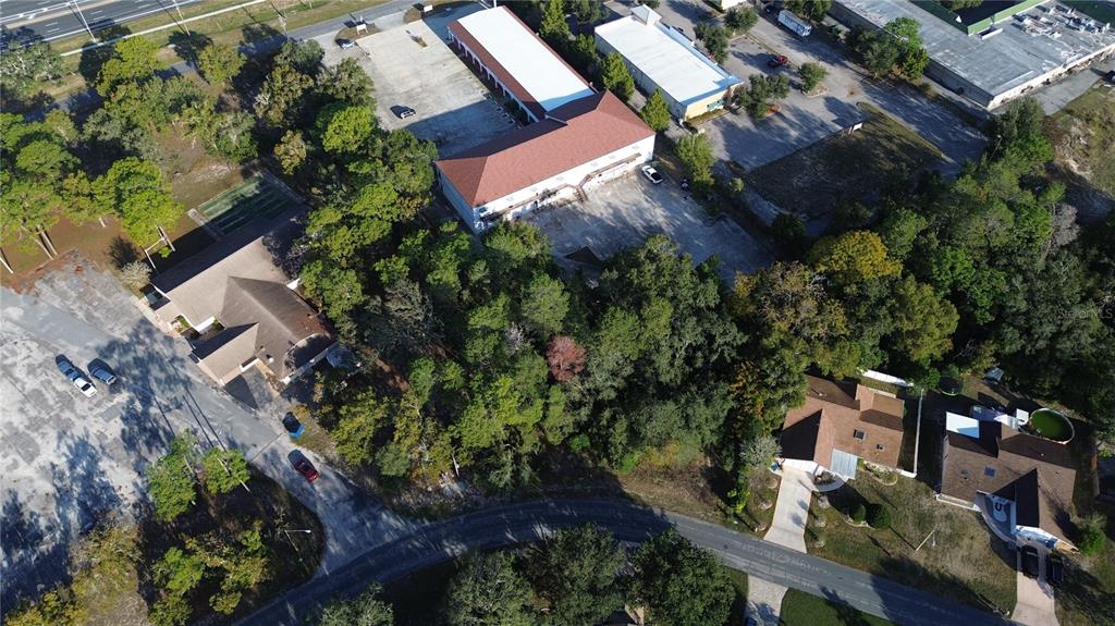 7931 Rhanbuoy Road Spring Hill, FL 34606 - Photo 10 of 14 an aerial view of a house with a yard