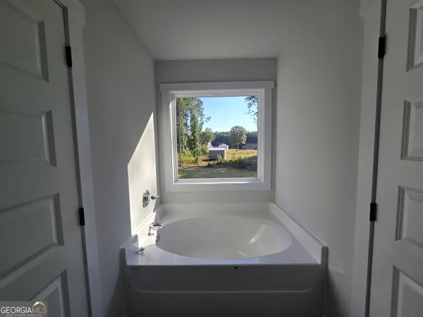a bathroom with a bathtub