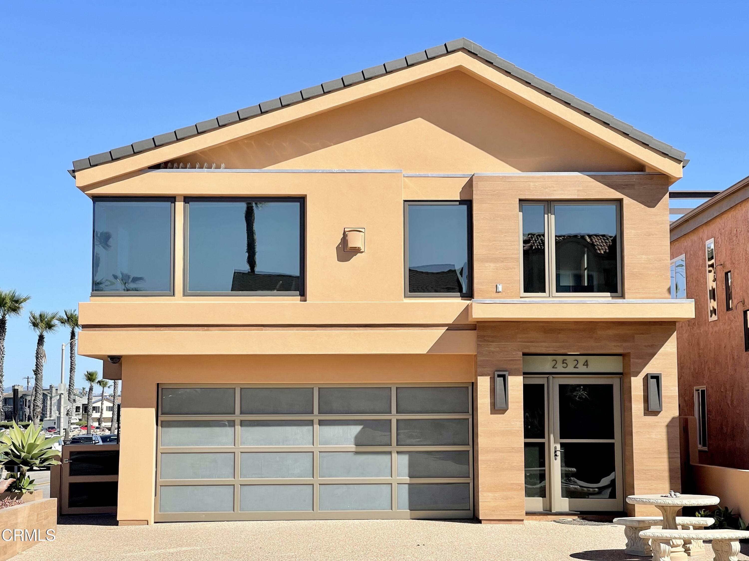 2524 Ocean Drive Oxnard, CA 93035 - Photo 21 of 28 a front view of a house with garage