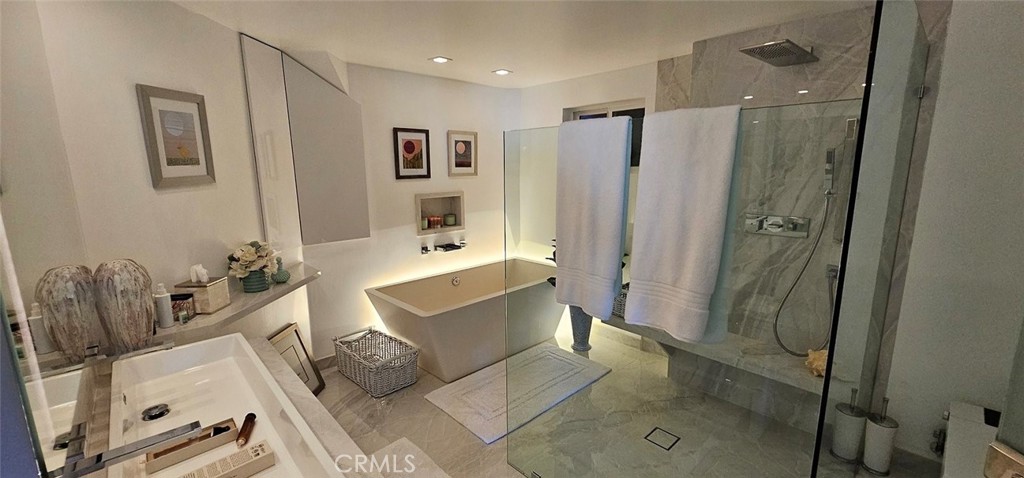 8109 Sinaloa Road Playa del Rey, CA 90293 - Photo 15 of 19 a bath room with a bath tub and a shower